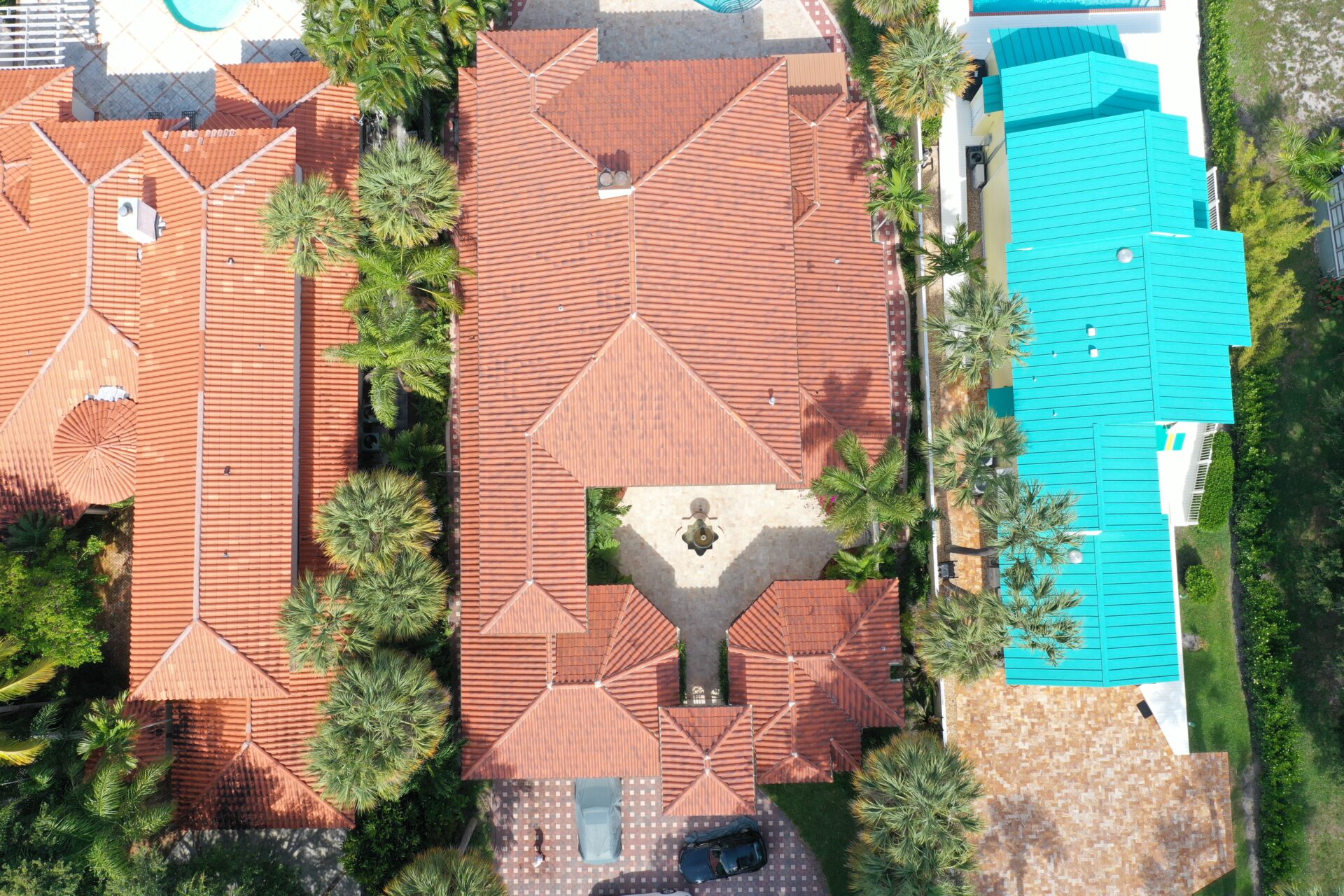 A bird 's eye view of a house with a pool.