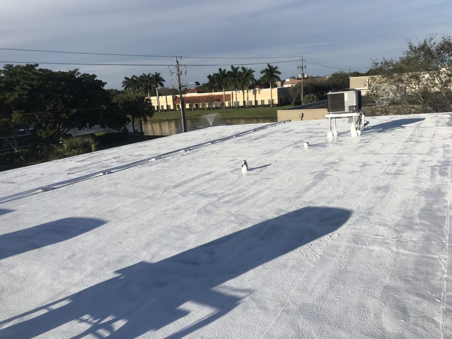 A white roof with many shadows on it